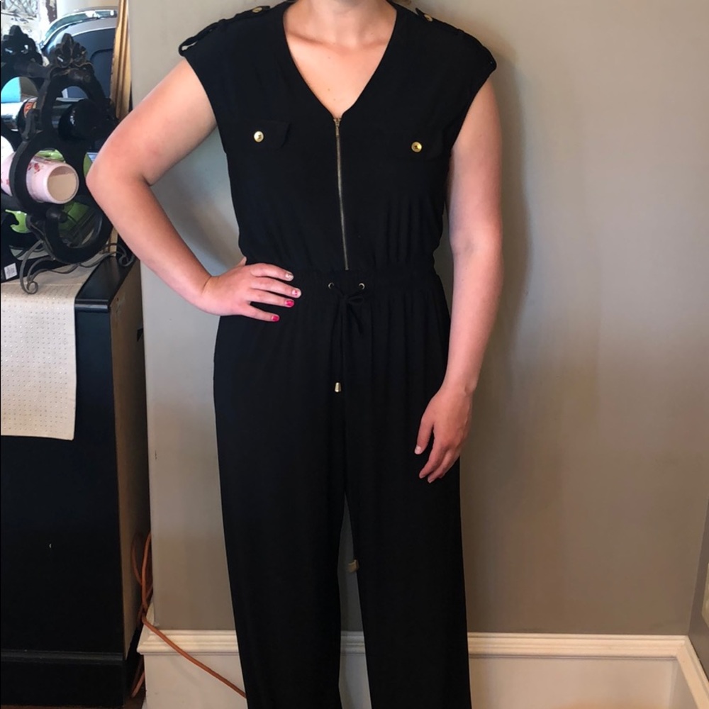 Black jumpsuit with gold detail